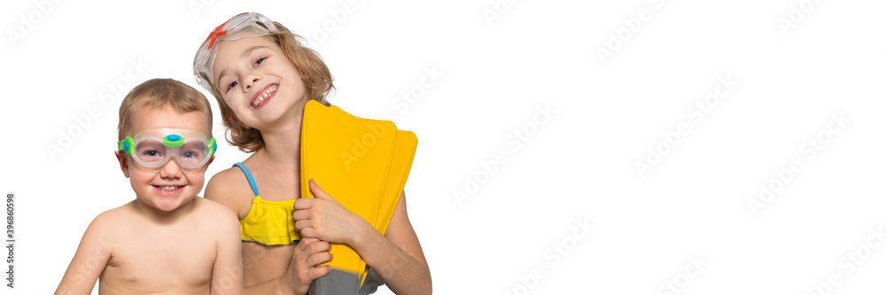 Children in suits for swimming on a headline background Children in suits for swimming on a headline background