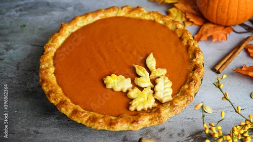 Homemade pumpkin pie with pastry crust, selective focus