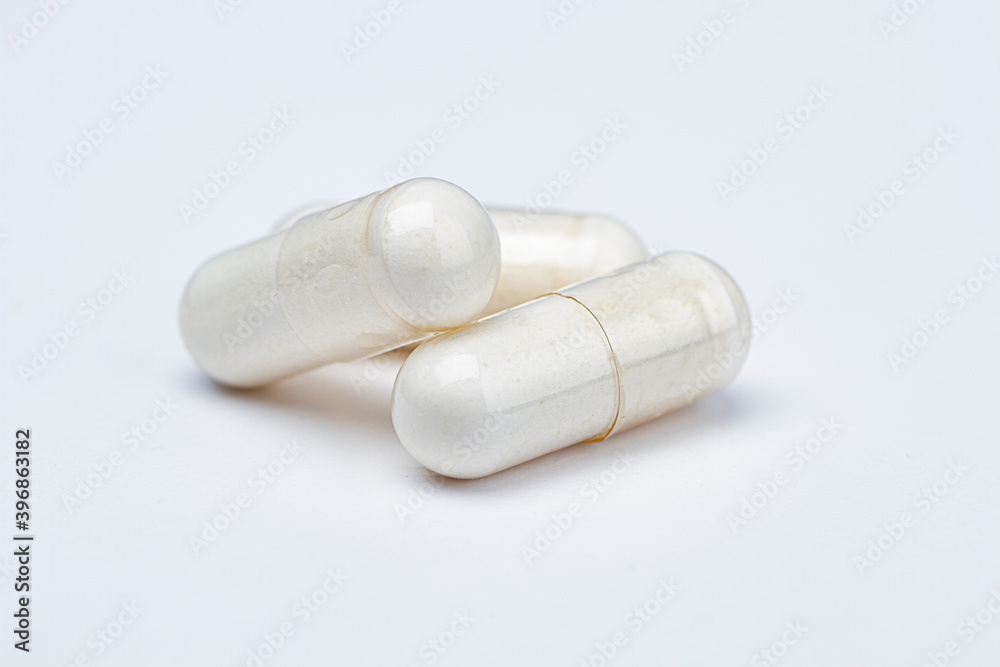 Stack of white pills Stack of white pills
