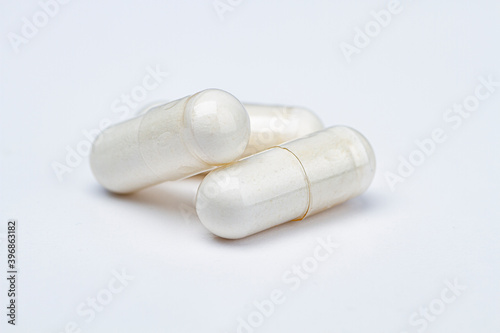 Stack of white pills photo