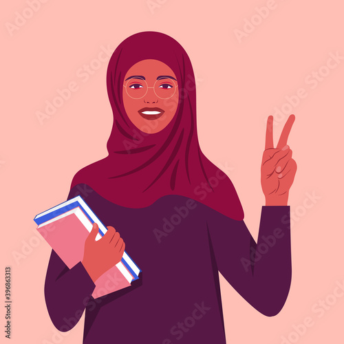 A muslim woman smiles and shows a victory sign. Happy Arab student with books wearing a headscarf. Hand gesture. Vector flat illustration