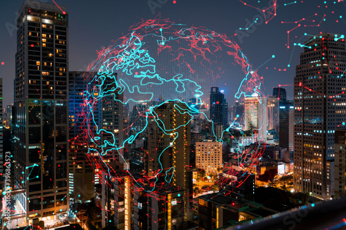 Obraz na plátně Hologram of Earth planet map on night panoramic cityscape of Bangkok, Asia