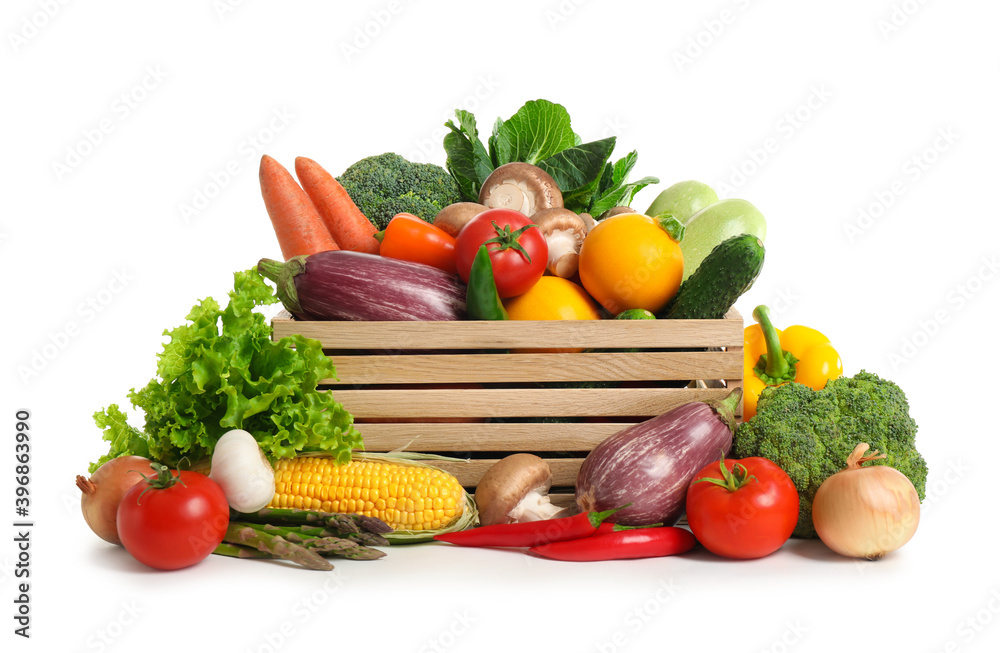 Wooden crate with fresh vegetables on white background Wooden crate with fresh vegetables on white background