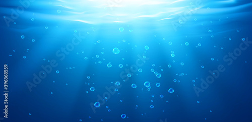 Carta da parati Underwater background, water surface, ocean, sea, swimming pool transparent aqua texture with air bubbles, ripples and sun rays falling, template for advertising