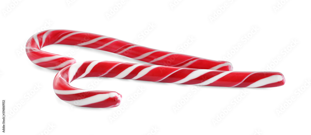 Fototapeta premium Sweet Christmas candy canes on white background