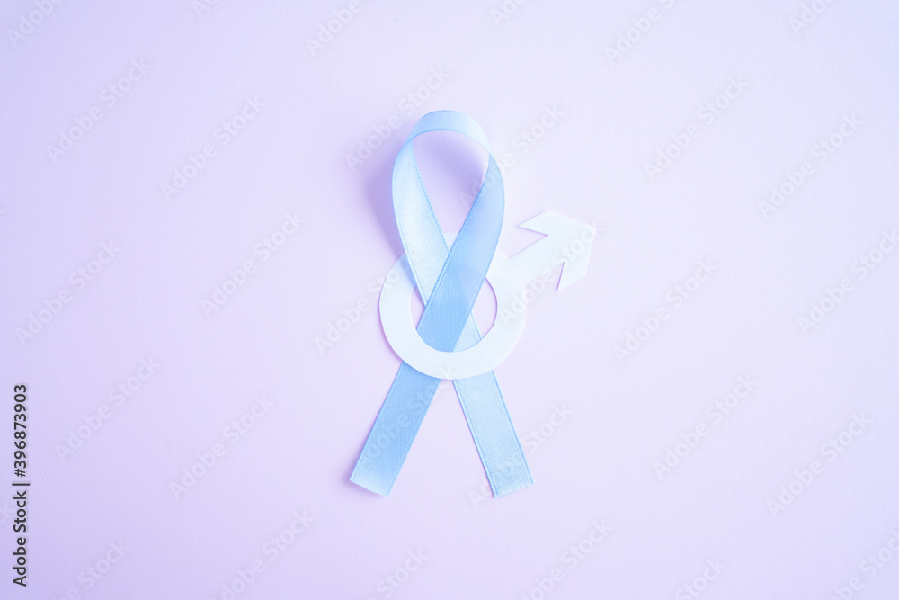 Prostate cancer awareness blue ribbon with white paper male sign mars arrow on pink background. Men healthcare concept, men carcinoma symbol. Prostate cancer awareness blue ribbon with white paper male sign mars arrow on pink background. Men healthcare concept, men carcinoma symbol.
