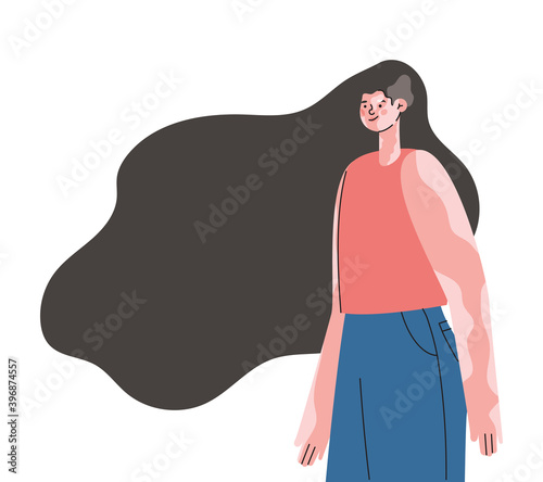 woman with vitiligo in salmon color shirt and blue jeans