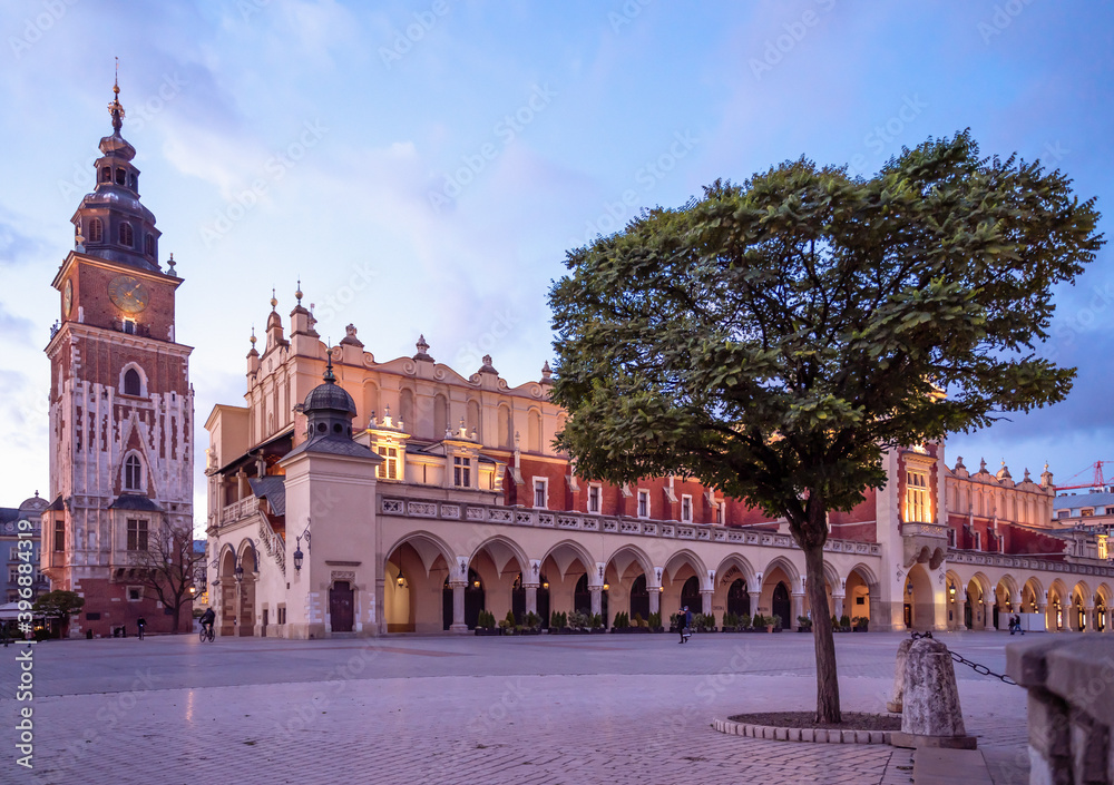 Krakow attractions in market square in the evening. Symbol of Krakow, Poland Europe.