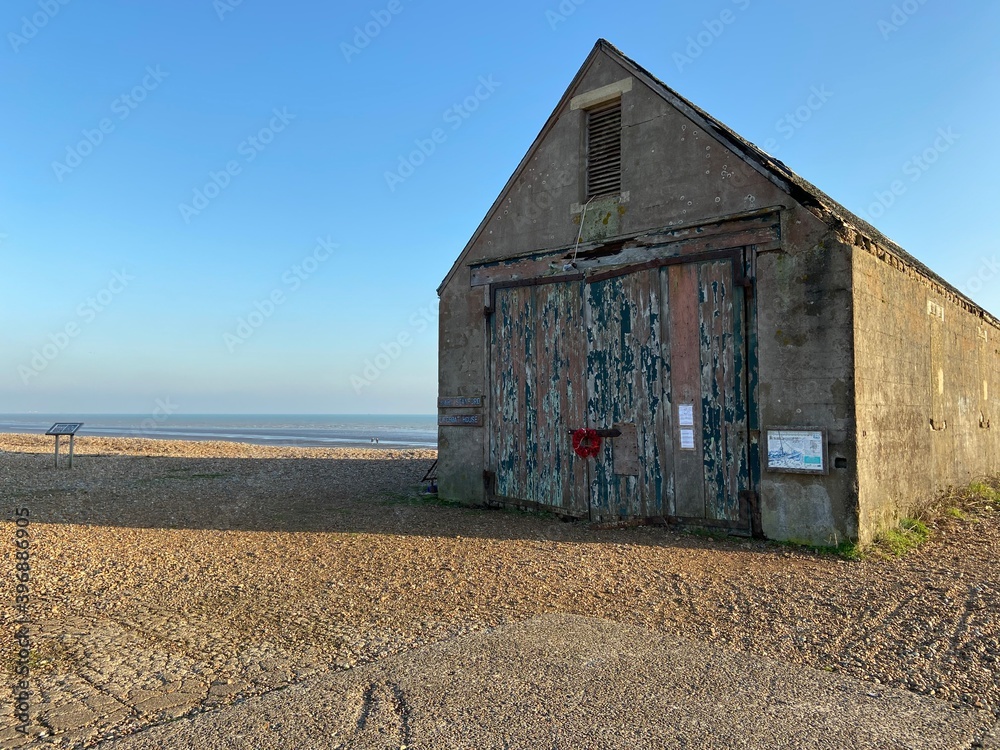 Winchelsea beach landscape view at low tide exposing flat sand with