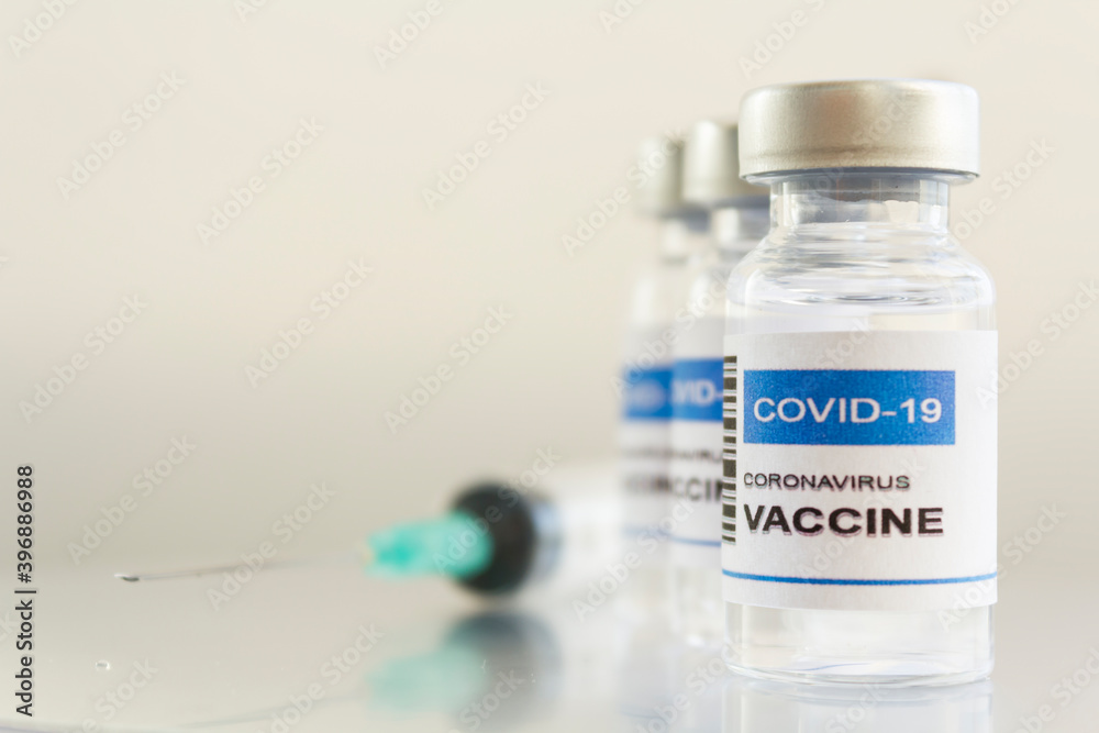 Syringe and laboratory Injection Vial with Covid-19 coronavirus vaccine