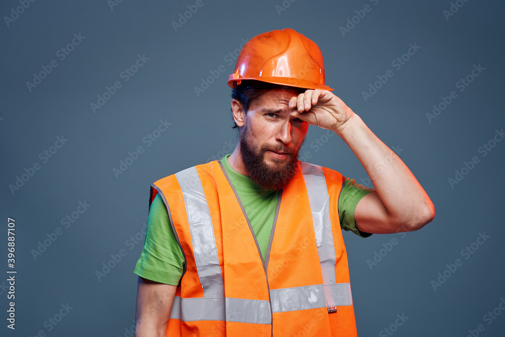 A man in a working uniform a professional construction close-up A man in a working uniform a professional construction close-up