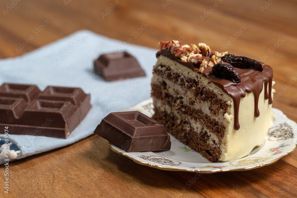 slice of homemade cake with chocolate and nuts slice of homemade cake with chocolate and nuts