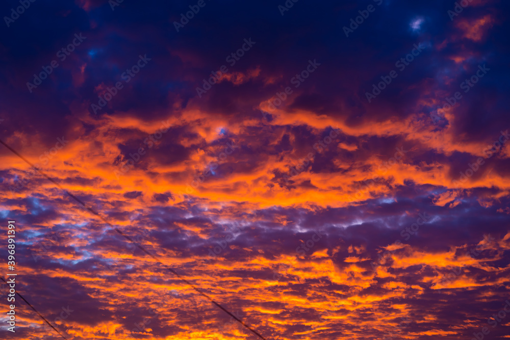 The colors of a burning sunset in the sky