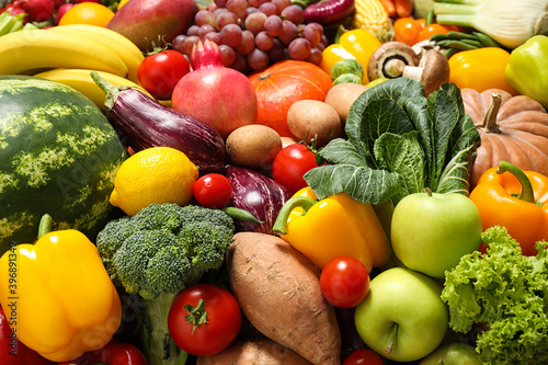 Assortment of organic fresh fruits and vegetables as background  closeup