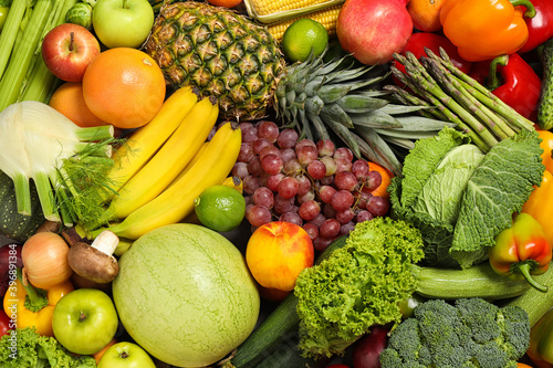 Assortment of organic fresh fruits and vegetables as background  closeup