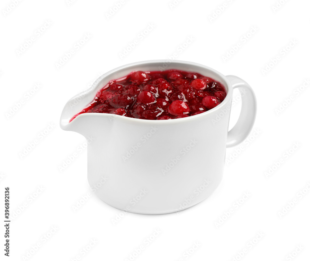Cranberry sauce in pitcher isolated on white Cranberry sauce in pitcher isolated on white