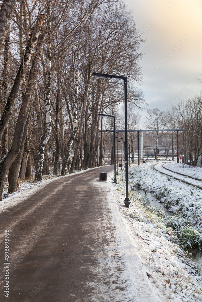An old abandoned railway on the outskirts of the city covered with snow. Railway signs. An old abandoned railway on the outskirts of the city covered with snow. Railway signs.