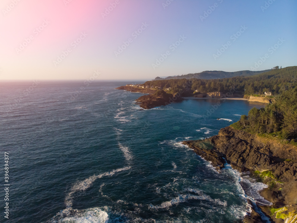 Fototapeta premium Aerial drone panoramic view of rocky cost in the ocean. Beautiful sunny weather. Amazing natural landscape. View from above.