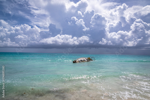 Half sunken yacht on the island of Saona. Dominican Republic, Beach on Saona island. © Armensl