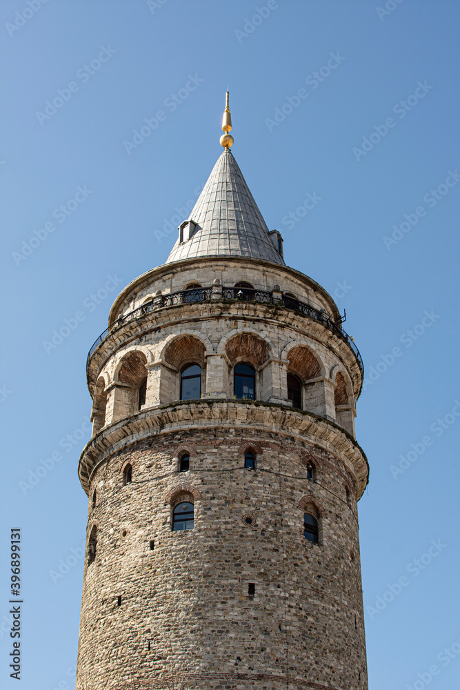 View of famous tourist place Galata tower from Serdar-I Ekrem street, Beyoglu district, Istanbul, Turkey