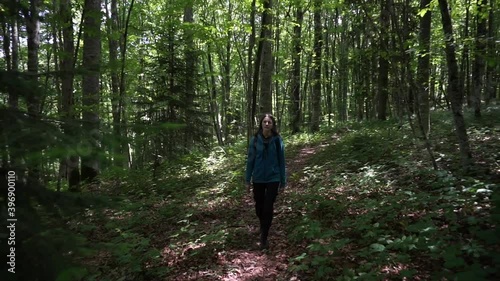 A girl walking in the woods