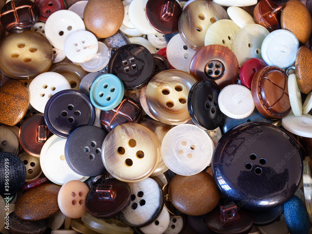 Close-up of pile of sewing buttons Close-up of pile of sewing buttons
