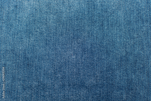  Close up blue jeans denim texture. Denim fabric background.