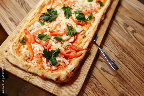 Pizza on wooden table top view. Fast food. Post blog social media. with copy space. Pizza ready to eat
