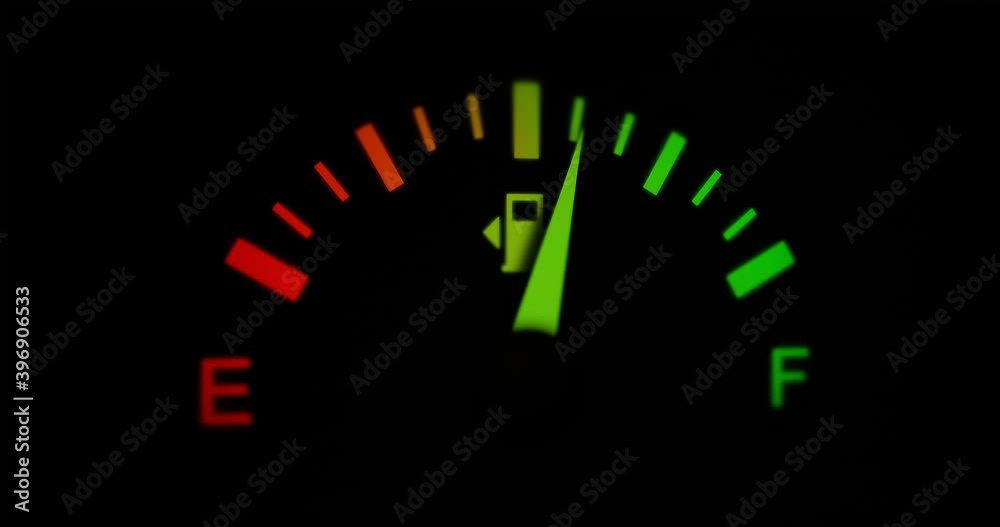 Fuel Gauge Car Dashboard Fills up. Green Red Orange Linear Gradient. Close Up dash board petrol meter on black background, Horizontal video clip in 4K . Gasoline Prices and Tax Concept. Soft Focus Fuel Gauge Car Dashboard Fills up. Green Red Orange Linear Gradient. Close Up dash board petrol meter on black background, Horizontal video clip in 4K . Gasoline Prices and Tax Concept. Soft Focus