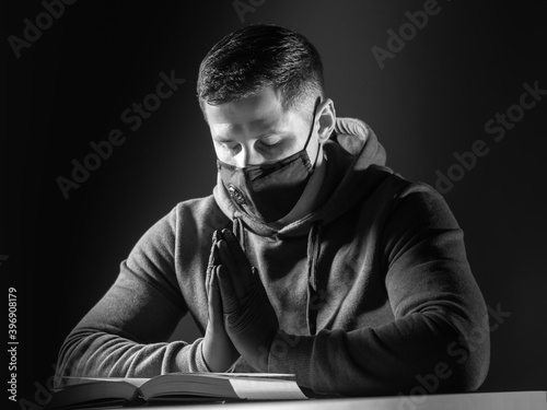 A man wearing a mask and gl...