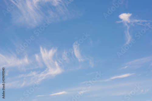 White clouds in a blue sky.