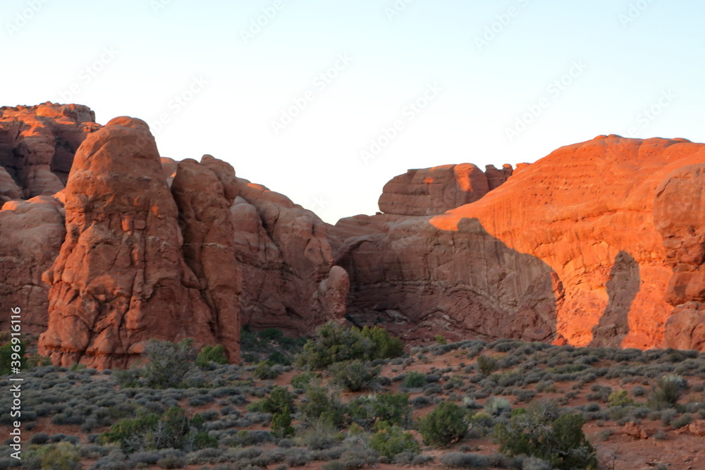 Fototapeta premium South Window Arch rocks at sunset, Arches National Park