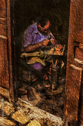 Fez, Morocco – May 10, 1997. Craftsman working on metal in a street workshop of Fez. With its old tanneries and large medina, this Moroccan city has been called the western Mecca. Oil paint filter.