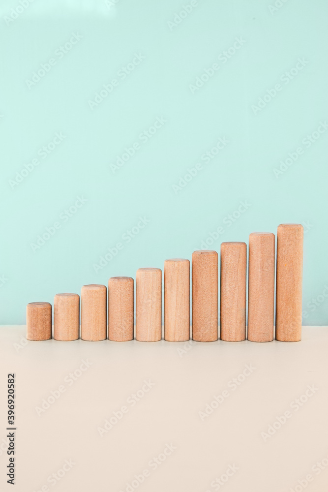 Abstract business increasing chart made from wood blocks with copy space. Blue colors art Abstract business increasing chart made from wood blocks with copy space. Blue colors art