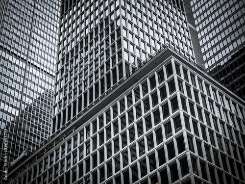 Canvas Print Densely packed skyscrapers and buildings in New York City on an overcast day in
