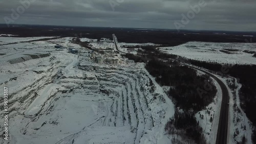 Quarry and oild and gold mine hole in forest in Canada orbit  - Drone 4k Aerial photo