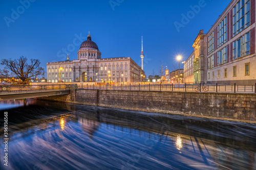 The reconstructed Berlin Palace with the Television Tower at the blue hour