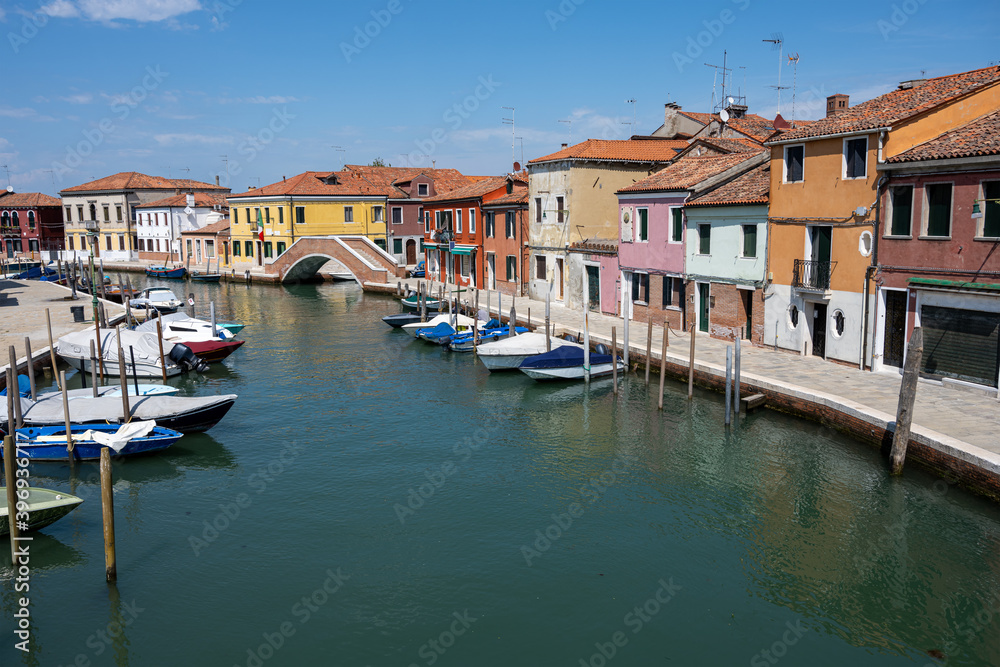 Colorful houses at a canal in Murano, Italy
