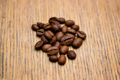 Coffee beans on a table top. 