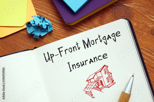 Up-Front Mortgage Insurance phrase on the piece of paper.