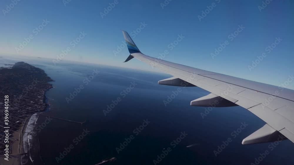 Airplane takes off from San Diego Airport in California. Heading off the coast over the Pacific Ocean towards Hawaii. 4K time-lapse capture on a sunny day. Airplane takes off from San Diego Airport in California. Heading off the coast over the Pacific Ocean towards Hawaii. 4K time-lapse capture on a sunny day.