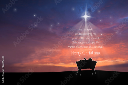 Christmas nativity scene of baby Jesus in the manger with scriptures in christmas tree shape