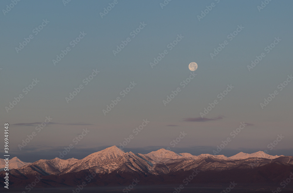 Kamchatka, moonset at dawn in the Mokhovaya region Kamchatka, moonset at dawn in the Mokhovaya region