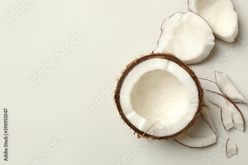 Fresh tasty coconut on white background, top view