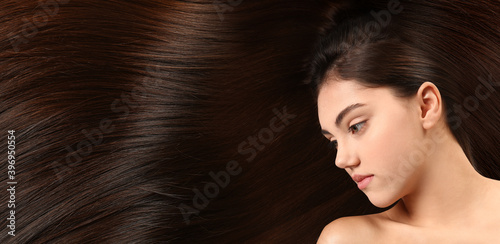 Young woman with beautiful straight hair