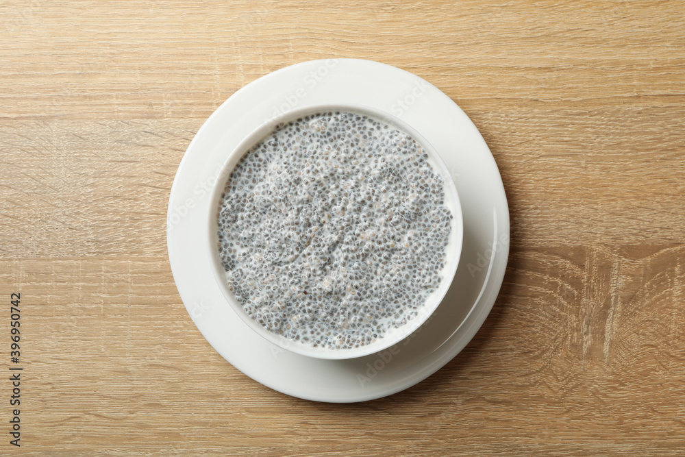 Bowl with chia pudding on wooden background Bowl with chia pudding on wooden background