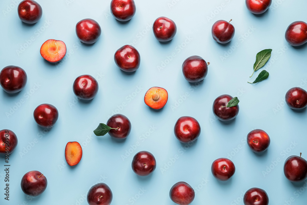 Fresh ripe plums on color background Fresh ripe plums on color background