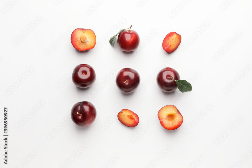 Fresh ripe plums on white background Fresh ripe plums on white background