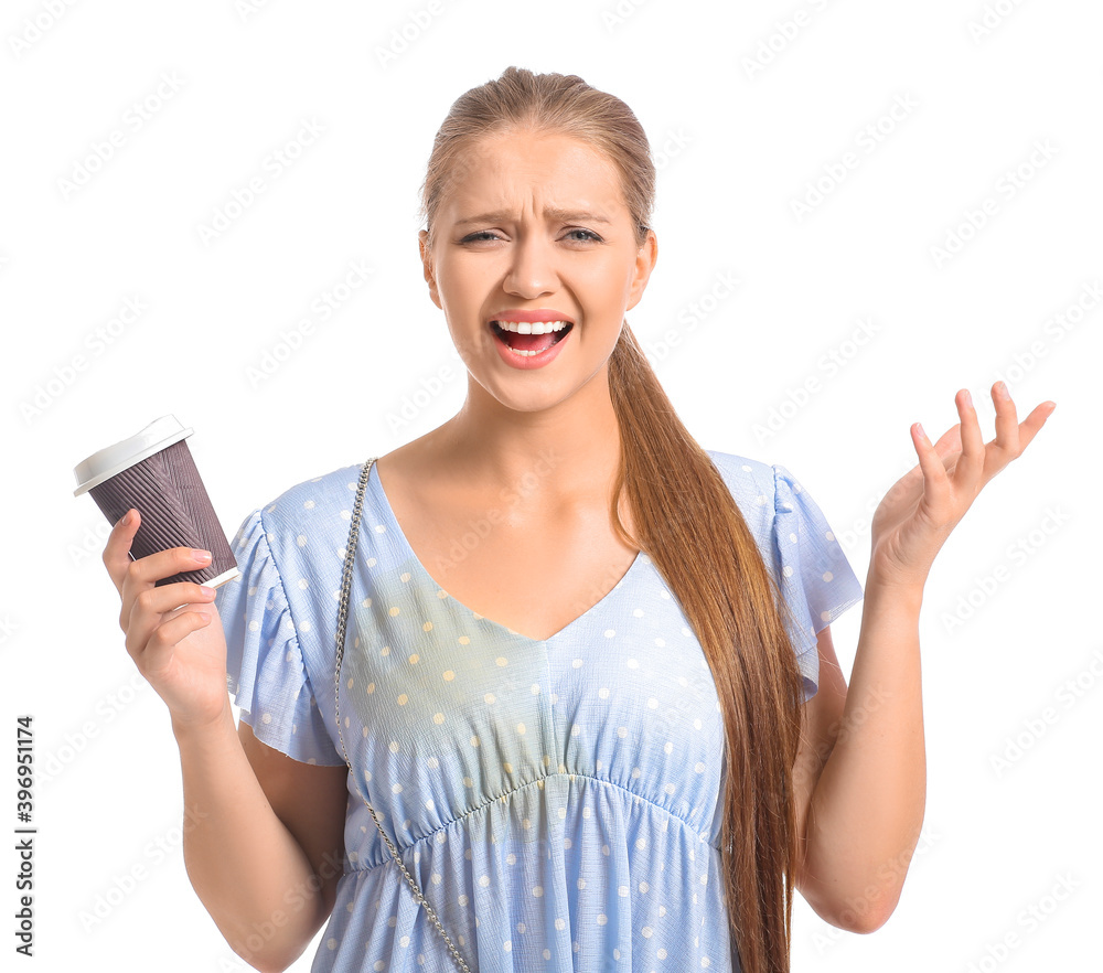 Stressed young woman with coffee stains on her dress on white background Stressed young woman with coffee stains on her dress on white background