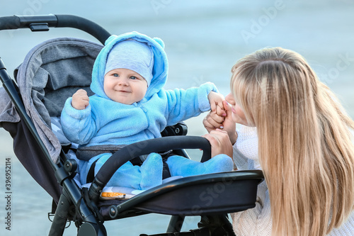 Woman and her cute baby in ...